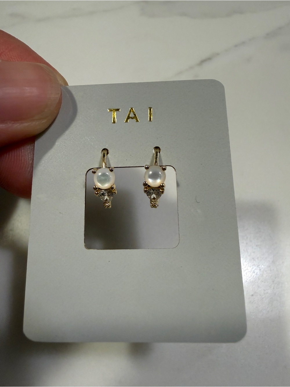 TAI Gold Huggie with CZ details and Mother of Pearl